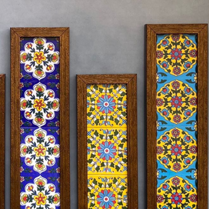Handpainted  bluepottery tiles wooden like wall frame in a set of five.