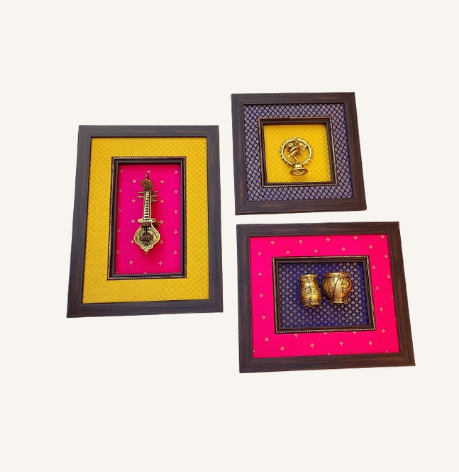 Brass wall frame in a set of three.