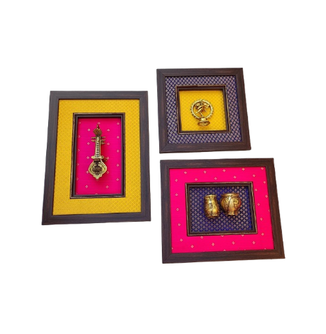 Brass wall frame in a set of three.