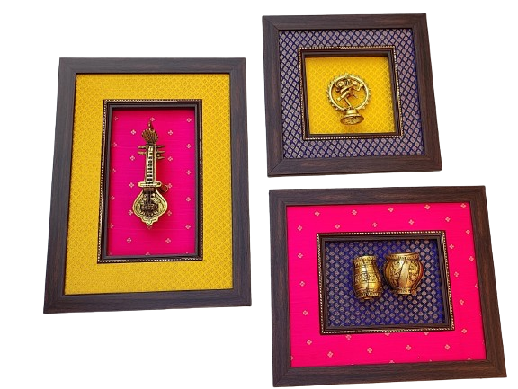 Brass wall frame in a set of three.